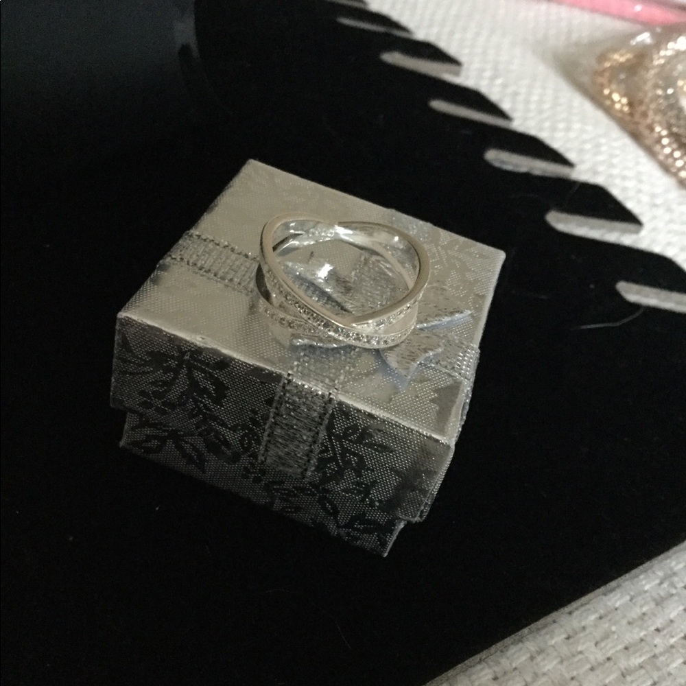 Sterling silver ring with white sapphires